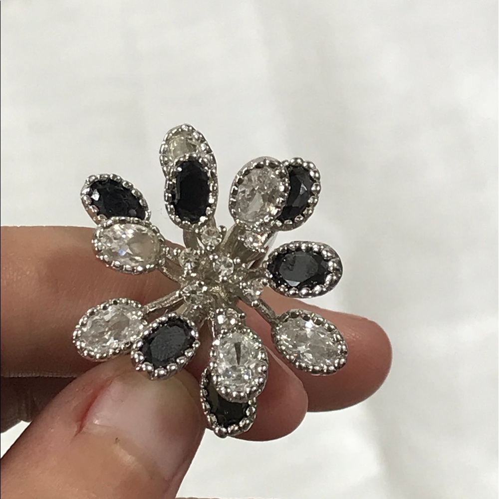 Black, white and silver ring